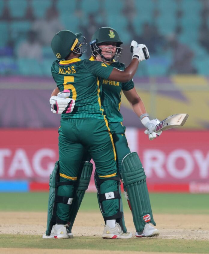 Nadine De Klerk of South Africa celebrates victory with Masabata Klaas after hitting the winning runs